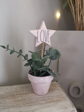 Load image into Gallery viewer, Potted Faux plant with wooden star pick
