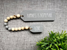 Load image into Gallery viewer, Positivity quote Wooden Tags with Bead Garland
