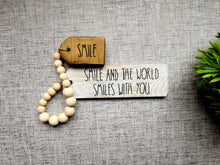 Load image into Gallery viewer, Positivity Quote Wooden Tag with bead garland
